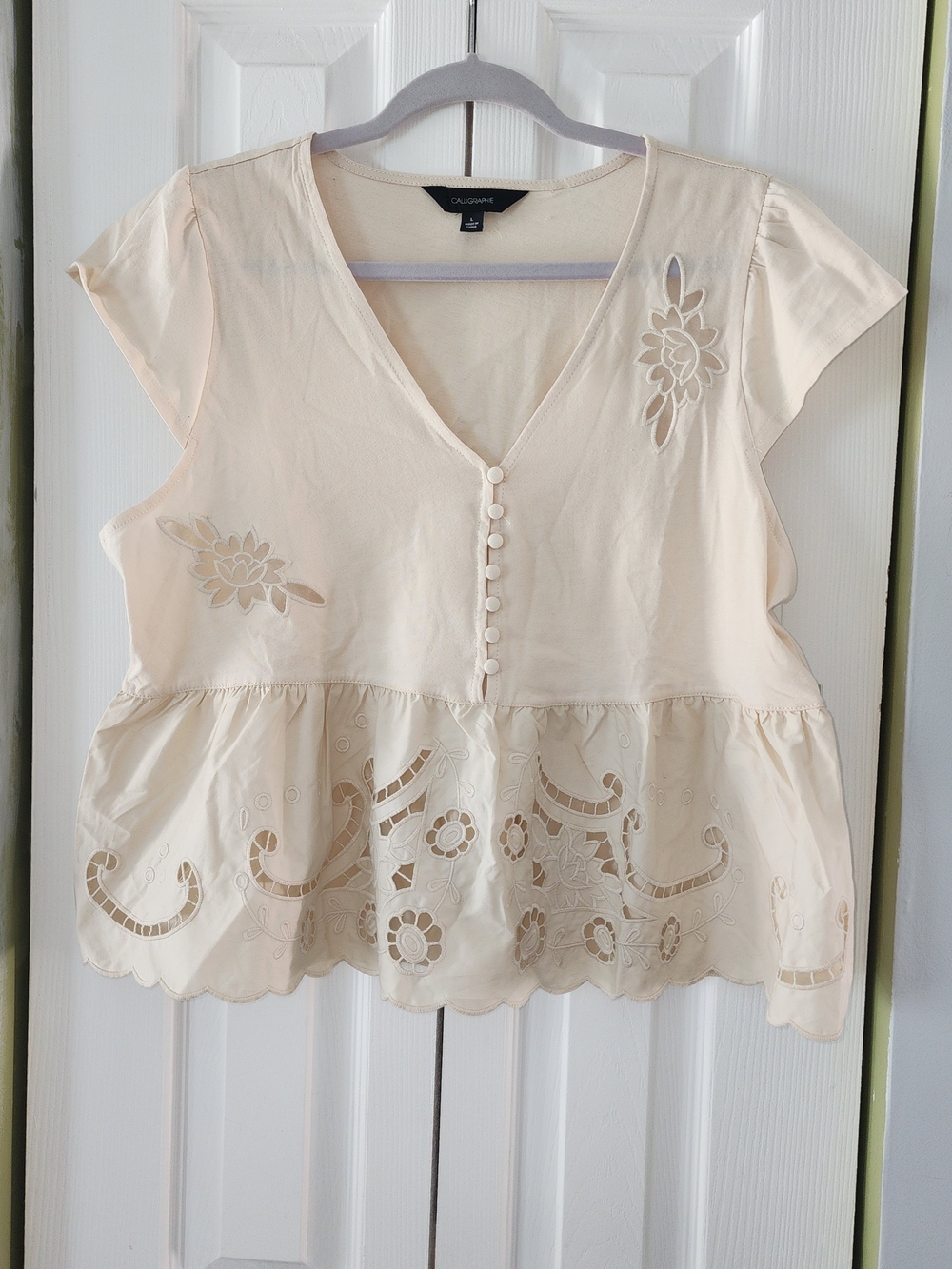 Eyelet Cutout Peplum Blouse in Cream Babydoll Floral